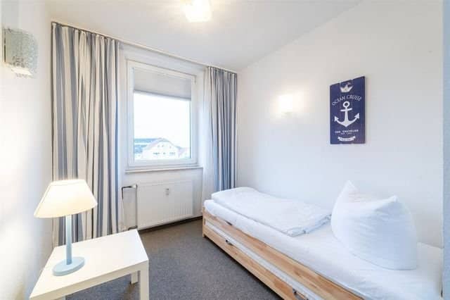 Toplage - Exklusive Ferienimmobilie mit Meerblick auf Borkum - Schlafzimmer